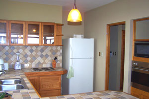 The modern kitchen has plenty of counter space.